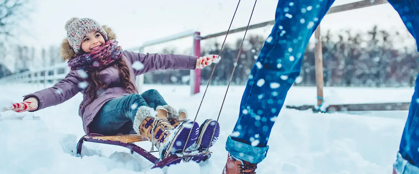 Vacances d'hiver en famille - activité luge